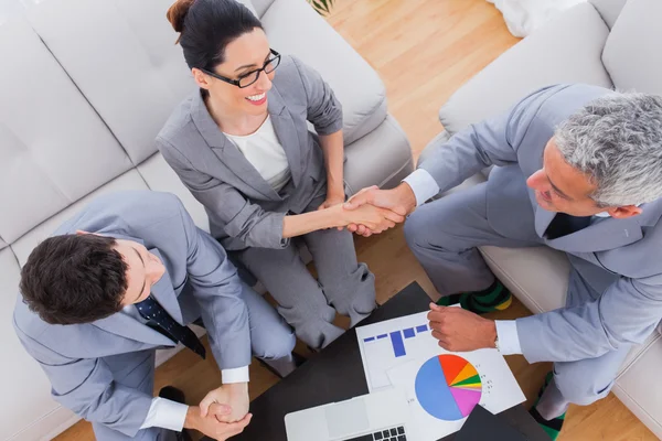 Smiling business shaking hands during meeting — Stock Photo, Image