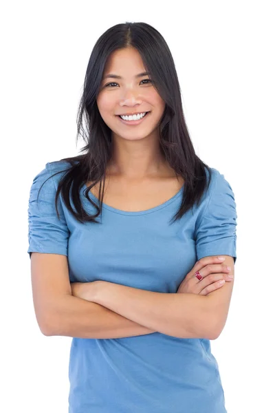 Smiling asian woman with arms crossed — Stock Photo, Image