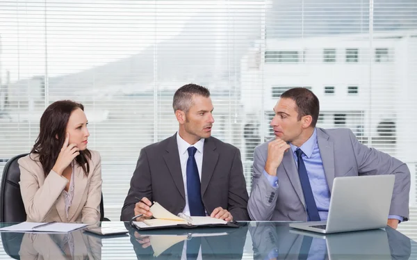 Serious business people talking together while waiting for inter — Stock Photo, Image