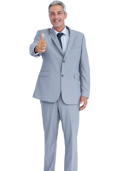 Positive businessman showing thumb up — Stock Photo, Image