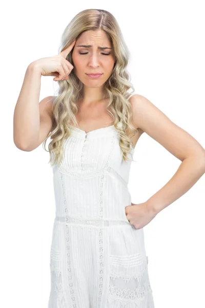 Curly haired blonde having headache — Stock Photo, Image