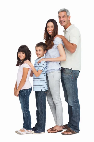 Portrait of a cute family in single file — Stock Photo, Image