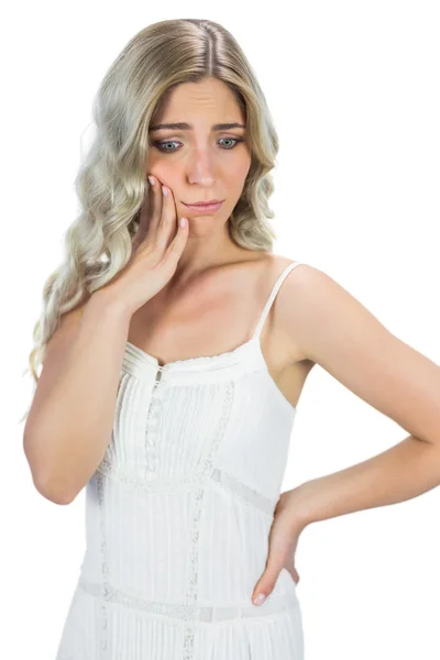 Anxious blond model thinking — Stock Photo, Image