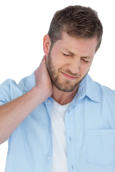 Trendy model having a painful neck — Stock Photo, Image