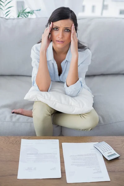 Fed up woman checking her bills — Stock Photo, Image
