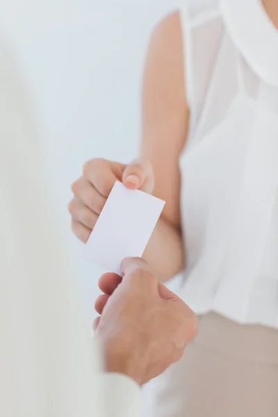 Businesswoman giving her business card — Stock Photo, Image