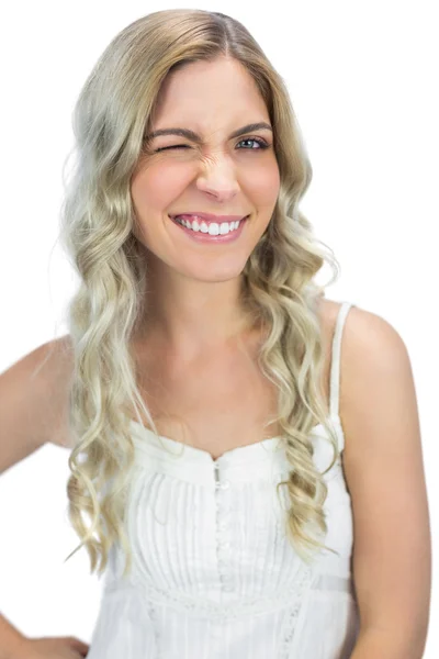 Attractive blond model winking to camera — Stock Photo, Image