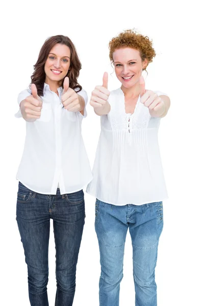 Two gorgeous casual models posing with thumbs up — Stock Photo, Image