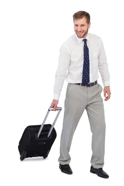 Cheerful businessman with suitcase — Stock Photo, Image