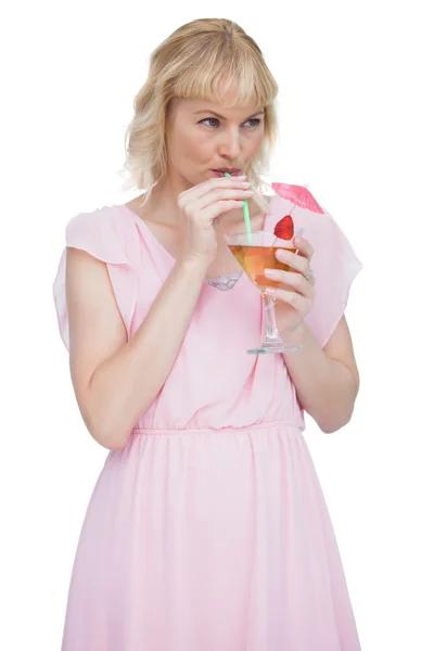 Attractive blonde drinking cocktail — Stock Photo, Image