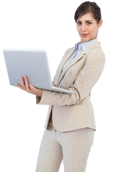 Confident young businesswoman with laptop Stock Picture