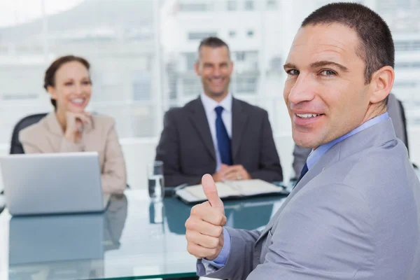 Applicant giving thumb up after obtaining the job Royalty Free Stock Images