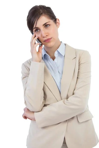 Verveeld zakenvrouw op de telefoon — Stockfoto