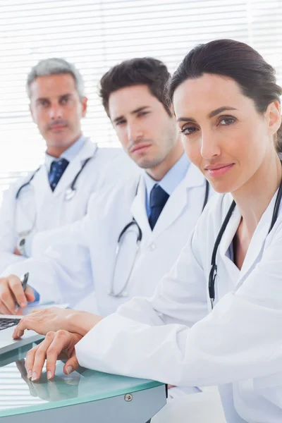 Doctors looking at camera — Stock Photo, Image