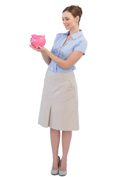 Empresária feliz com banco porquinho — Fotografia de Stock