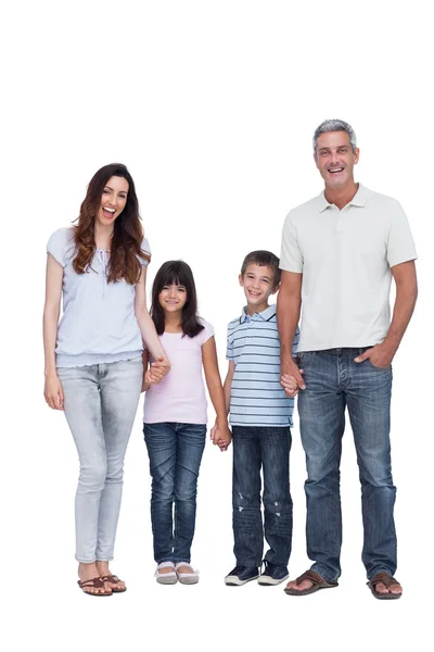 Fröhliche Familie hält Händchen — Stockfoto