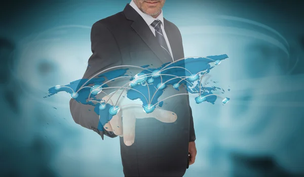 Businessman touching futuristic world map interface — Stock Photo, Image