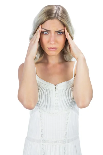 Sensual blonde having a headache — Stock Photo, Image