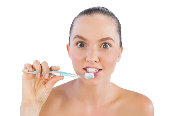 Funny woman with toothbrush — Stockfoto