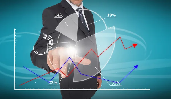 Businessman touching futuristic pie chart interface Stock Picture