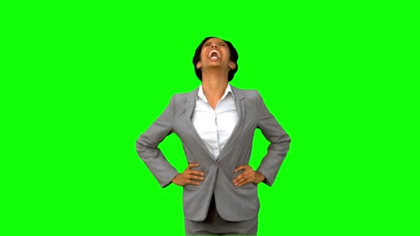 Attractive businesswoman laughing on green screen — Stock Video