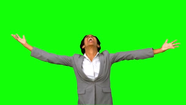 Angry businesswoman raising arms on green screen — Stock Video