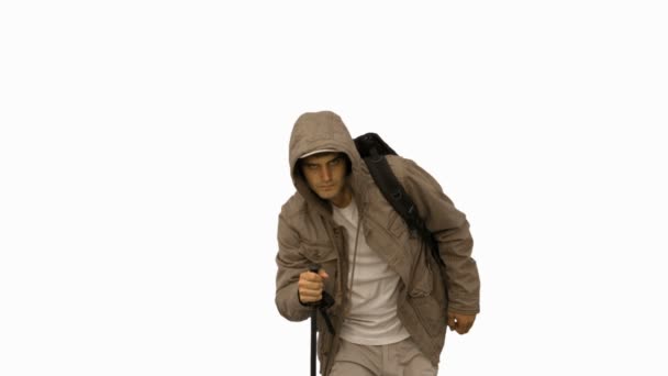Homem bonito com um casaco trekking na tela branca — Vídeo de Stock