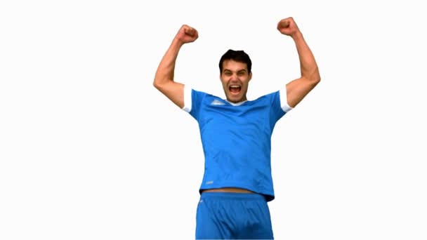 Happy football player raising arms on white screen — Stock Video