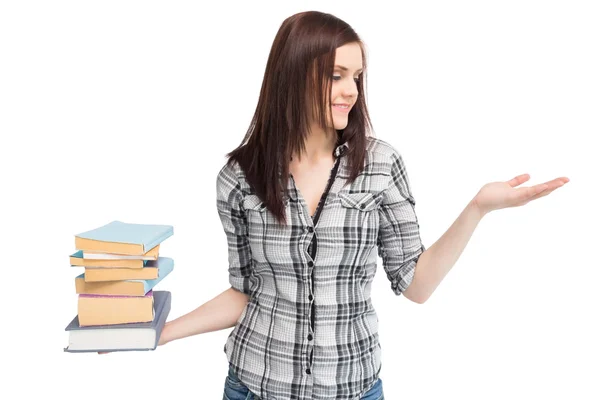 Feliz estudiante bonita sosteniendo pila de libros —  Fotos de Stock