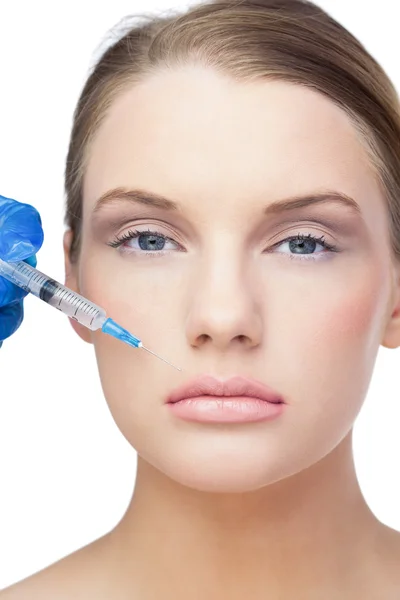 Calm beautiful blonde having injection above the lips — Stock Photo, Image