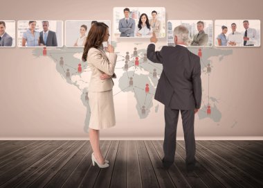 Business people selecting digital interface together clipart