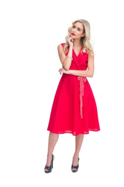 Thoughtful woman posing in red dress clipart