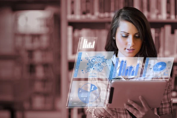 Young focused student using a tablet computer — Stock Photo, Image