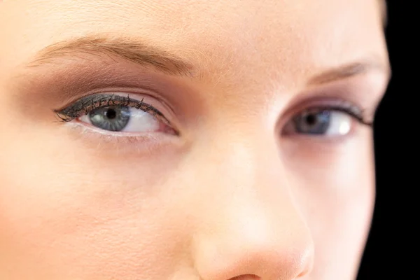 Close up on beautiful models blue eyes — Stock Photo, Image