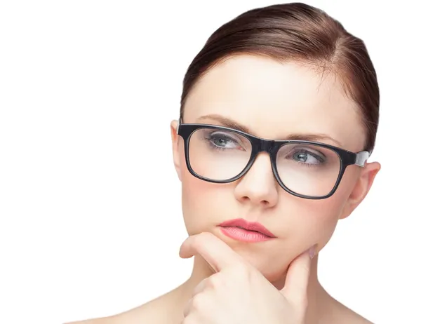 Thinking natural model wearing classy glasses — Stock Photo, Image