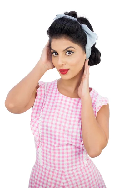 Thoughtful black hair model styling her hair — Stock Photo, Image