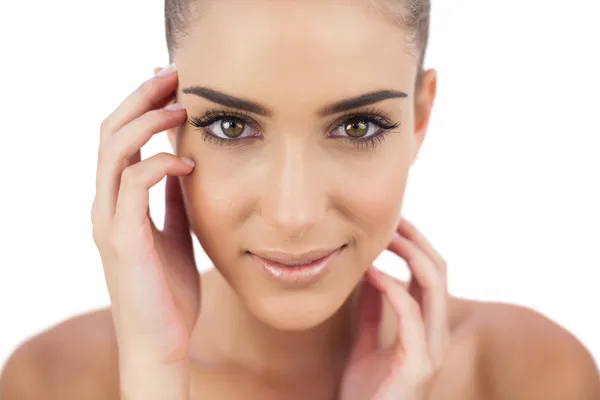 Close up van een lachende vrouw kijken camera — Stockfoto