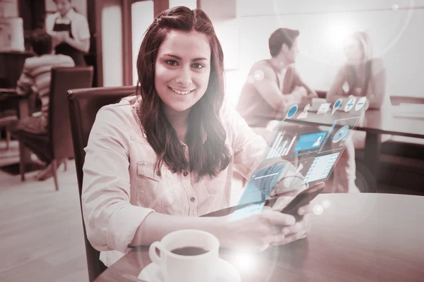 Cheerful young woman studying on futuristic smartphone — Stock Photo, Image