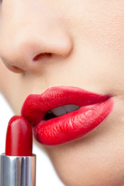 Extreme close up on gorgeous red lips being made up — Stock Photo, Image