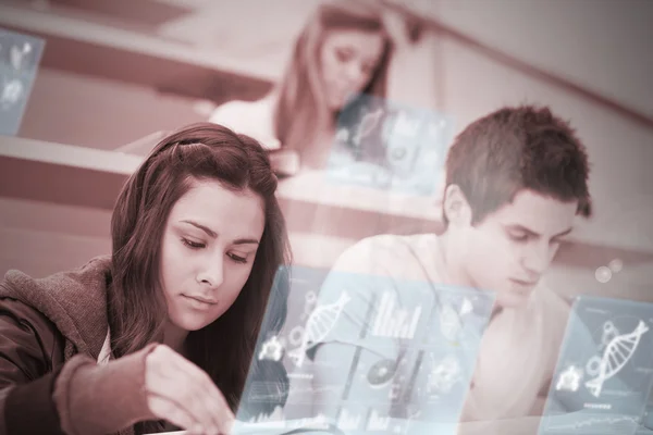 Students using futuristic hologram to learn about science from tablet pc — Stock Photo, Image