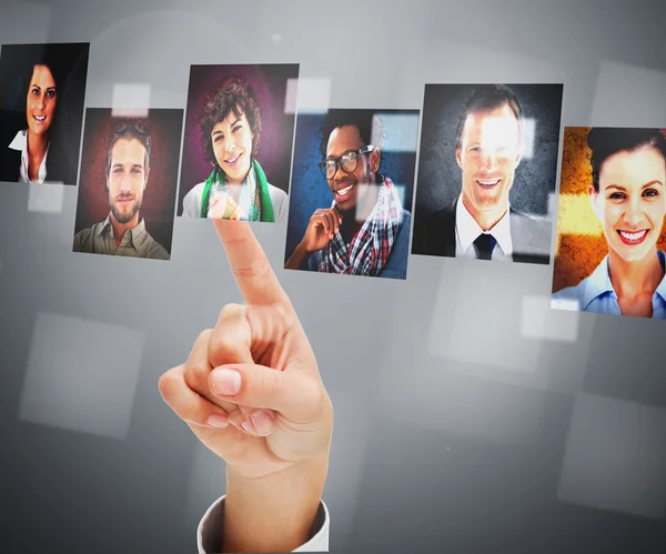 Female finger pointing at digital interface — Stock Photo, Image