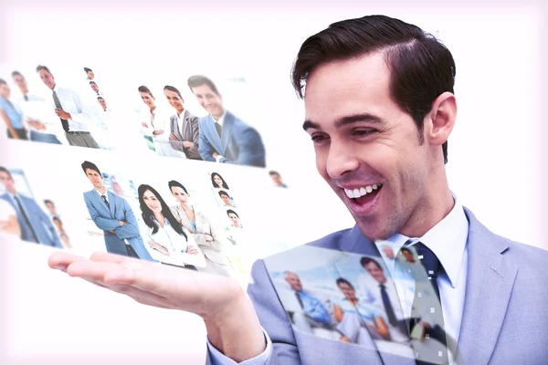 Pleased man admiring pictures — Stock Photo, Image