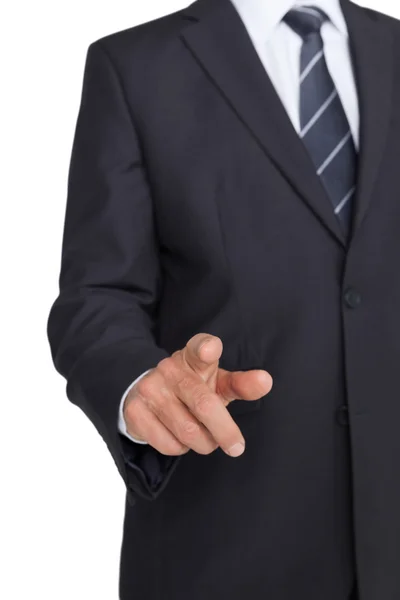 Geschäftsmann im Prozess zeigt mit dem Finger — Stockfoto