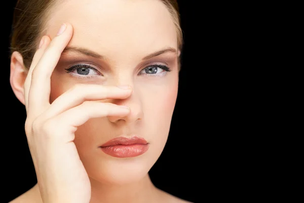 Glamorous young model posing hand on face — Stock Photo, Image