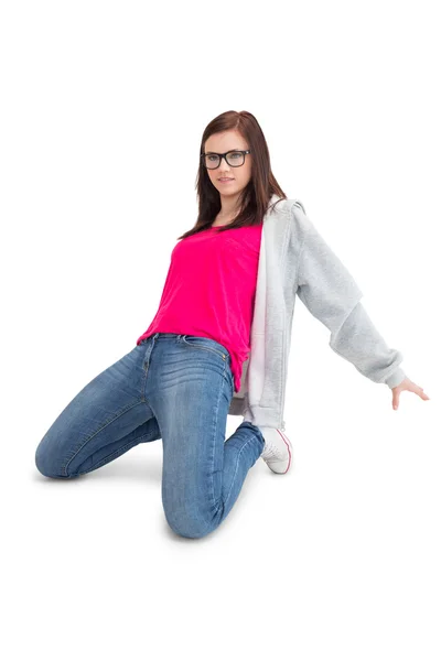 Smiling young woman making hip hop pose — Stock Photo, Image