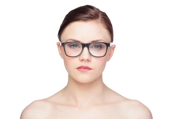 Pensive natural model wearing classy glasses — Stock Photo, Image