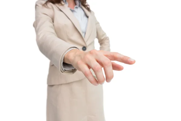 Stylish businesswoman touching invisible screen — Stock Photo, Image