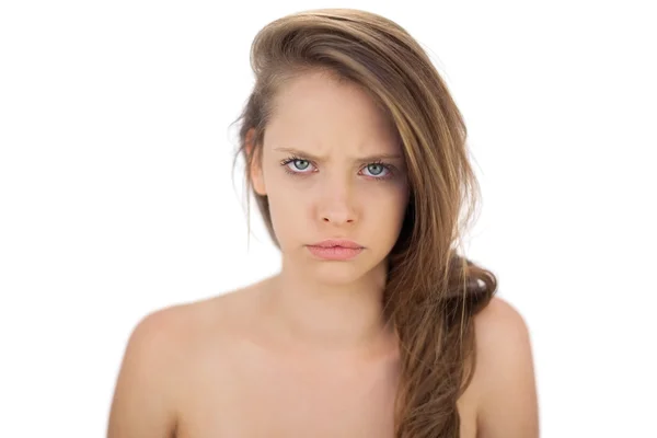 Frowning brunette model looking at camera — Stock Photo, Image