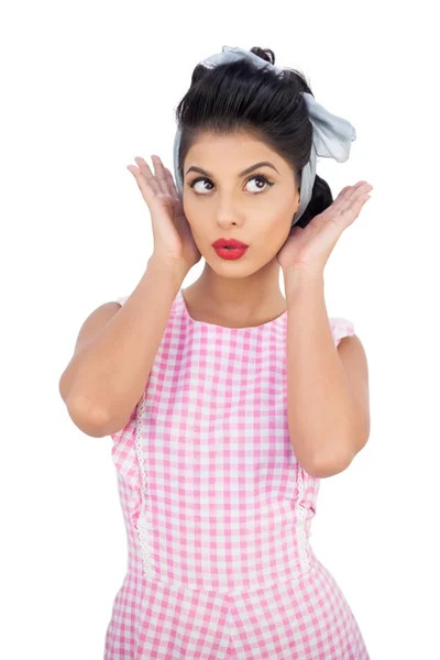 Concentrated black hair model styling her hair — Stock Photo, Image