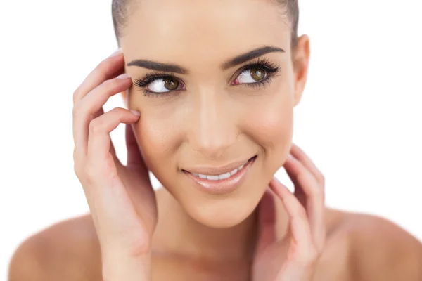 Close up of a smiling woman looking away — Stock Photo, Image